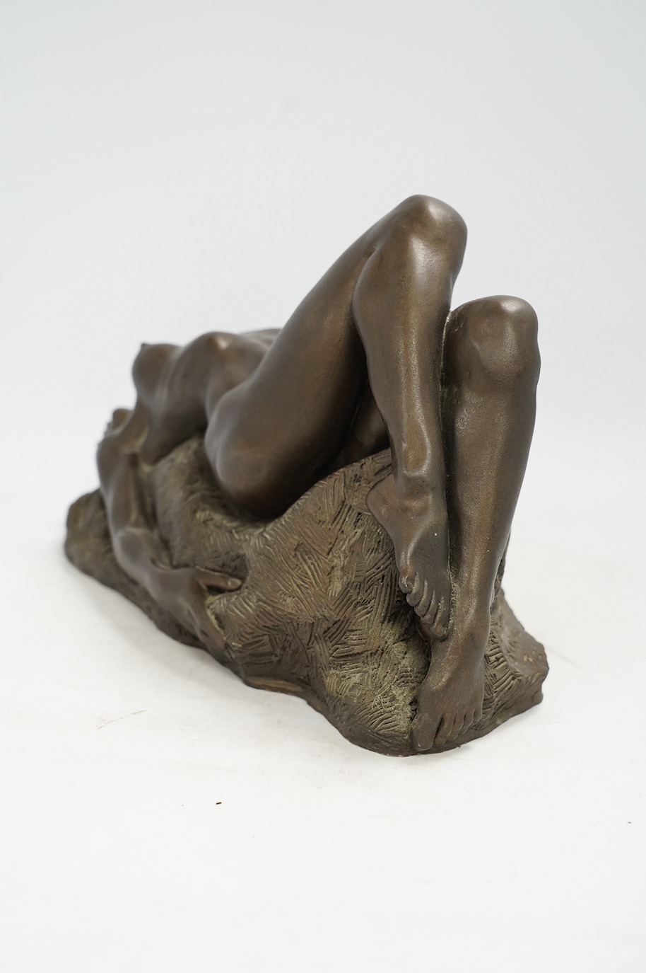 Ronald Cameron, 'Marnie', cold cast resin bronze of a reclining nude, signed, limited edition 7/25, 36cm wide. Condition - good